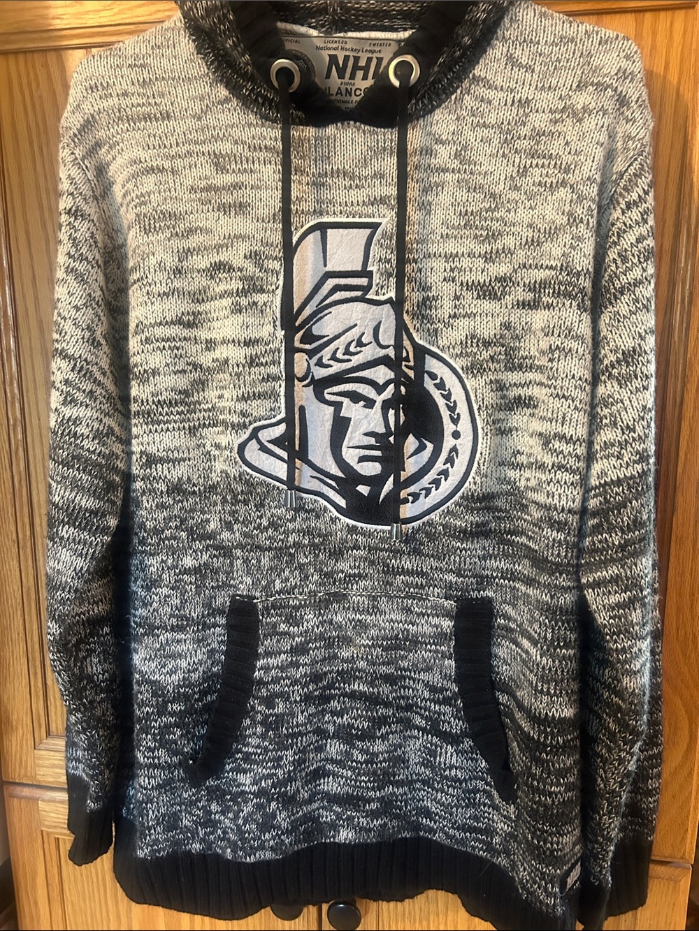 NHL Black and Gray Marled Knit Hoodie with Team Crest